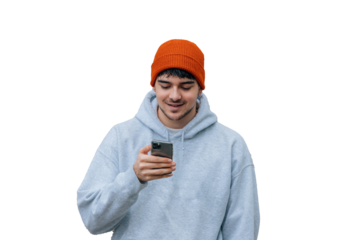 young university man on the street looking at the mobile phone with american urban styling