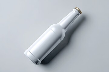 Blank white beer bottle, gold cap, studio shot