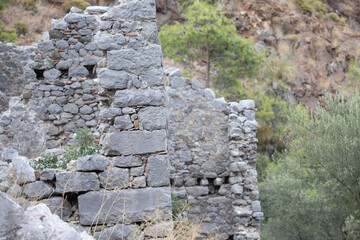 Stone Wall Ruins with Hillside Background