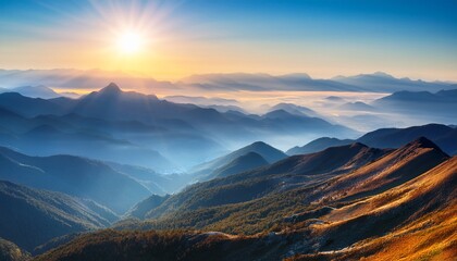 Obraz premium mountain range and sunlight in hazy landscape