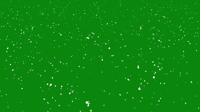 White Snowfall Effect animation on green screen background. Falling Snow Animation | Christmas & Holiday Video Overlay. Beautiful snow falling animation with seamless looping flakes.