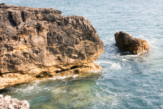 Waves Crashing on Rugged Shoreline in Portugal