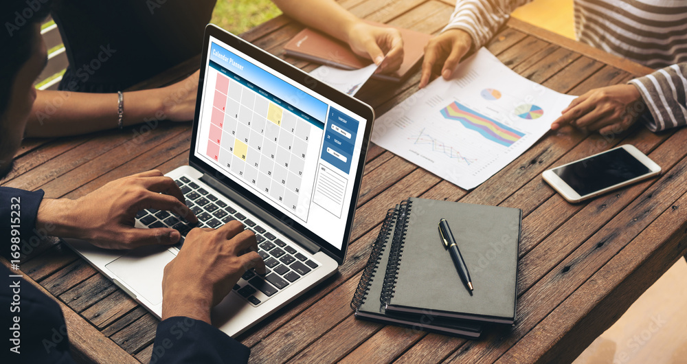 Poster calendar on computer software application for modish schedule planning for personal organizer and on