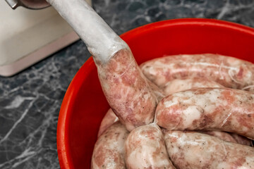 Cooking sausages raw minced meat using natural shell meat grinder home