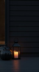 A modern minimalist outdoor scene features two sleek black pumpkins and a glowing candle inside a dark lantern on a wooden porch at night.