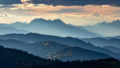 Panoramic view of mountain ranges at sunset