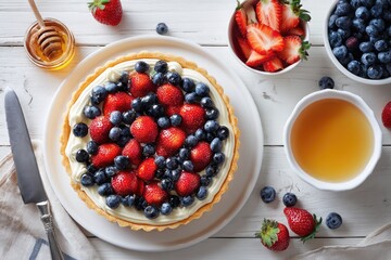Fresh berry tart on a white table