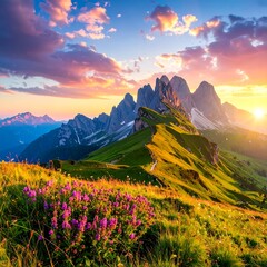 Obraz premium A breathtaking mountain vista at sunrise, showcasing vibrant colors and lush greenery.