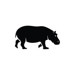 Obraz premium Black silhouette of a hippopotamus walking on a white isolated background