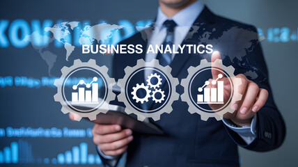 Business analytics and data visualization concept with businessman pointing