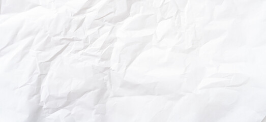 Top view and full frame of wrinkled or crumpled white paper texture used as crumpled white paper background texture in decorative art work