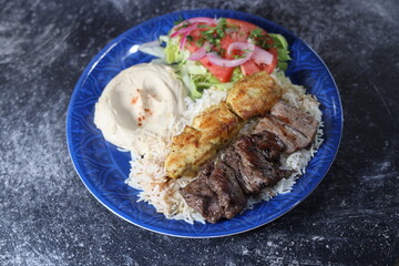 Halal Mix Grill with Rice, Hummus, and Salad &ndash; Middle Eastern Platter