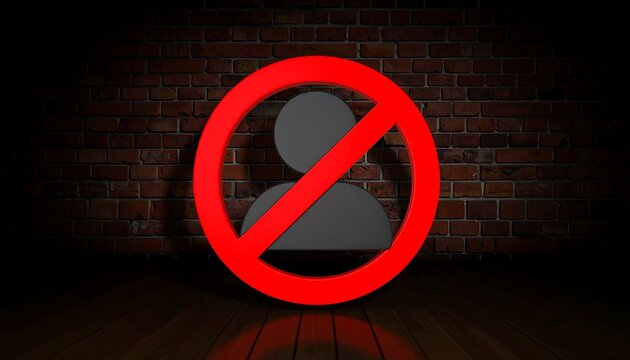 Red no-entry symbol on wooden floor against brick wall
