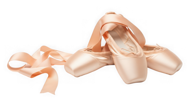 Pair of delicate pink satin ballet pointe shoes with ribbons, isolated on transparent background