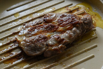 meat steak grill on pan in the kitchen