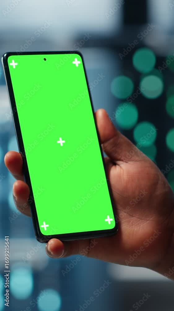 Poster vertical video manager using app on chroma key phone to check server farm energy consumption. data c