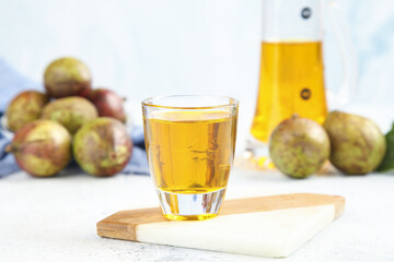 Wild Harvested Camellia Seed Oil Glass with Fresh Seeds and Bottle Natural Beauty Product