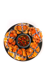 Yangcheng Lake Hairy Crabs with Sauce on Black Plate White Background Chinese Seafood Delicacy