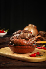 Fresh Ginger and Turmeric Roots with Sichuan Chilies on Wooden Cutting Board - Organic Farm Ingredients