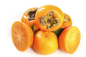 Fresh Ripe Persimmon Fruits Whole and Sliced on White Background