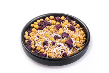 Healthy grain bean combination with soybeans rice and dried vegetables in black bowl