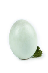 Fresh Duck Egg with Parsley on White Background
