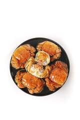 Steamed Yangcheng Lake Hairy Crabs on Black Plate White Background Closeup