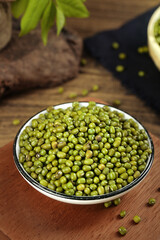 Fresh Organic Mung Beans in Bowl - Nutrient Rich Legumes for Healthy Vegetarian Cooking on Rustic Wooden Background
