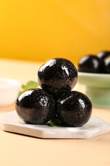 Black Sesame Seed Balls Closeup - Healthy Asian Dessert Made with High Dietary Fiber Ingredients