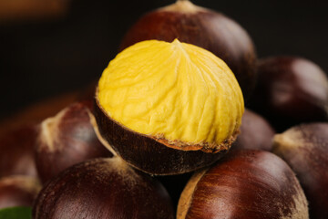 Fototapeta premium Fresh Roasted Chestnuts with Golden Yellow Flesh - Autumn Seasonal Food Ingredient