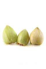 Three Green Buckwheat Seeds on White Grain Background Closeup Macro Food Photography