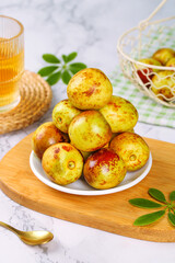 Fresh Red Jujube Dates from Dali Yunnan China on Wooden Serving Board Traditional Asian Fruit