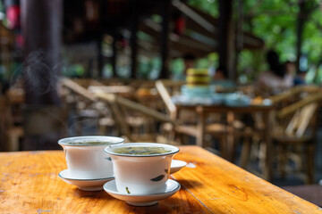 Elegant Tea Ceremony in an Outdoor Teahouse Amid Natural Surroun