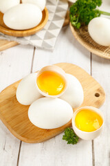 Large Fresh Goose Eggs on Wooden Tray with Golden Yolks - Farm Fresh Organic Ingredients