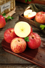 Fresh Honey-Glazed Red Apples on Rustic Wooden Board - Seasonal Fruit Display