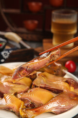 Air-Dried Whole Duck Handmade Farmers Style on Wooden Plank with Chopsticks Traditional Asian Cuisine