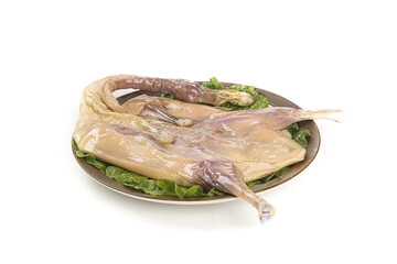 Whole Air-Dried Duck Traditional Farmers Style on Plate with Lettuce Garnish