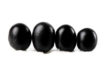 Four Black Soybeans in Row on White Background - Healthy Protein Food Ingredient
