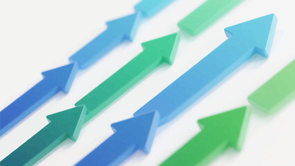 Upward trending arrows in blue and green symbolize business growth