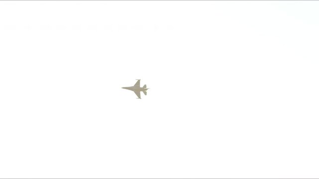 IZMIR, TURKIYE - September 9, 2025 Turkish Air Force General Dynamics F-16C Fighting Falcon SoloTurk (4R-23) Aerobatic Demonstrate over Izmir City During Liberation Day Air Force Footage.