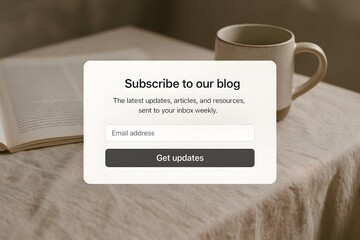 Simple and elegant blog subscription form on a table. 
