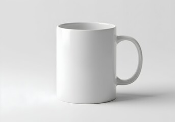 Fototapeta premium Clean white ceramic mug with ergonomic handle design isolated on white background perfect for beverage serving