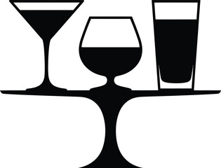 Silhouette of three different cocktail glasses on a tray