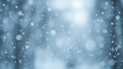 Obraz premium Gentle snowfall in soft illumination, evoking quiet winter mood.