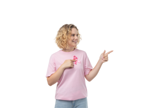 Woman dressed in pink happily pointing to the side, isolated, PNG