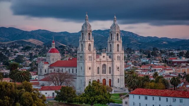 Majestic cathedral with terracotta roofs stands tall against a backdrop of rolling hills and a vibrant cityscape.