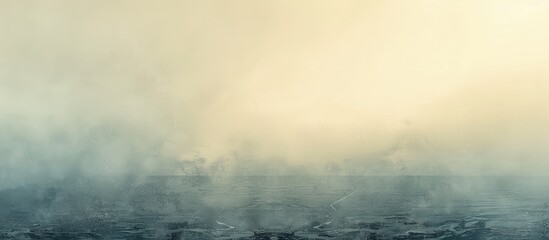 Obraz premium A misty, low-lying landscape stretches to a pale, hazy sky. The ground is dark and textured, almost obscured by the swirling fog