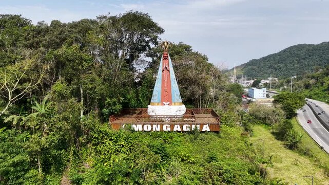 Religious Symbol Of Mongagua In Sao Paulo Brazil. Religious Skyline. Downtown Cityscape. Our Lady Of Aparecida Saint. Religious Symbol At Mongagua In Sao Paulo Brazil. Patron Saint Hill.