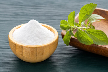 Bowl with stevia powder - Leaves of the stevia plant
