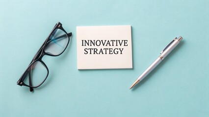 Innovative Strategy Concept with Glasses and Pen on Turquoise Background for Business and Creativity Themes